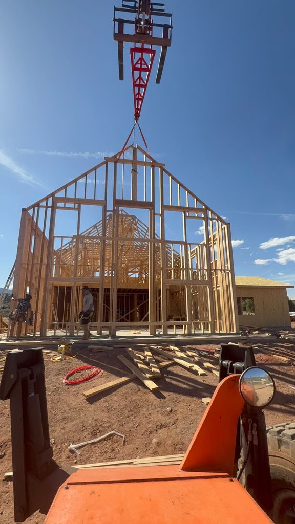 Roof trusses being set during construction